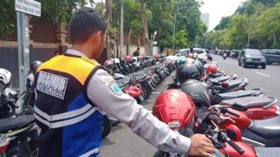 Attachment for Jukir liar di Surabaya Menghadapi Masa Depan Tak Pasti akibat Surat Edaran Baru Pemkot